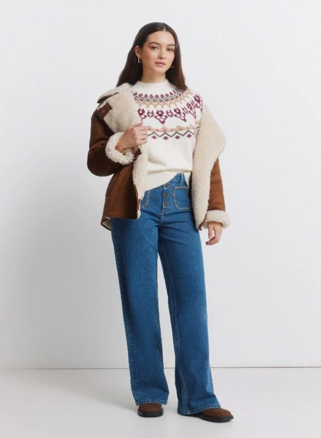 Springfield High-waisted jeans with front and back patch pockets, front buttons fastening , and a very wide, straight leg. These jeans feature a washing process using cutting-edge technologies, reducing water, chemical, and energy consumption.