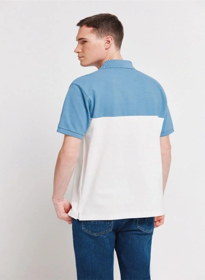 Springfield  1% cotton piqué regular fit cut and sewn polo shirt with ribbed collar and cuffs and contrast embroidered Springfield logo for Men | Best Price UAE