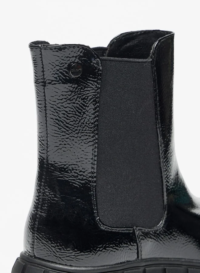 Celeste Women's Solid Slip-On Flatform Boots