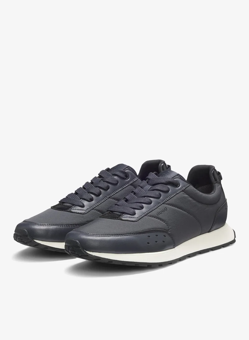 هوجو أحذية رياضية مستوحاة من الجري بتفاصيل متعرجة