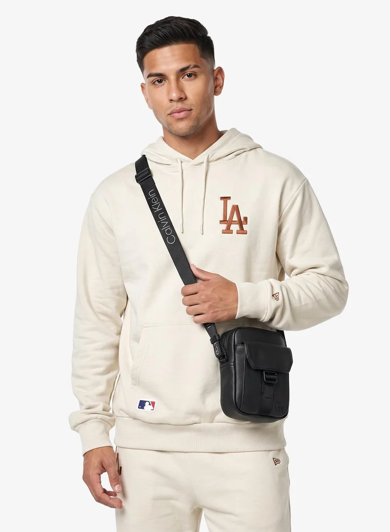 Calvin Klein Black / White Webbing Logo Webbing Slim Reporter Bag for Men | Best Price UAE