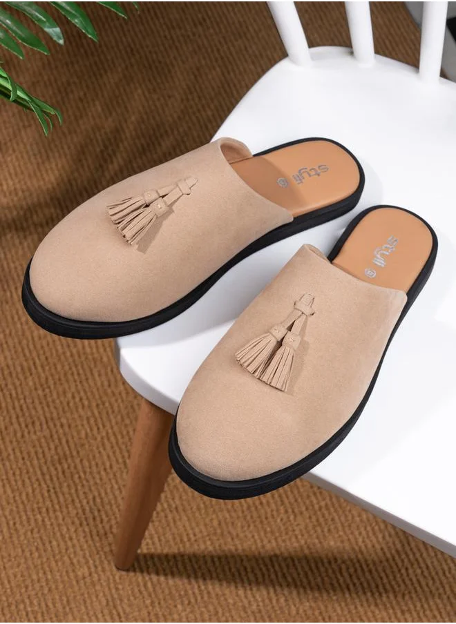 Styli Suede Clogs with Tassel Detail