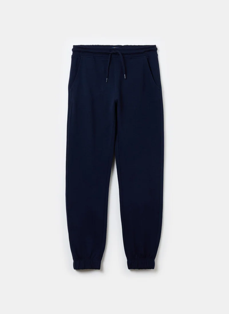 او في اس Solid colour fleece joggers with drawstring