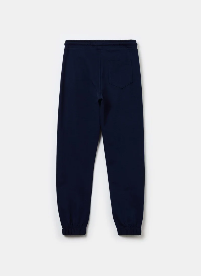 او في اس Solid colour fleece joggers with drawstring