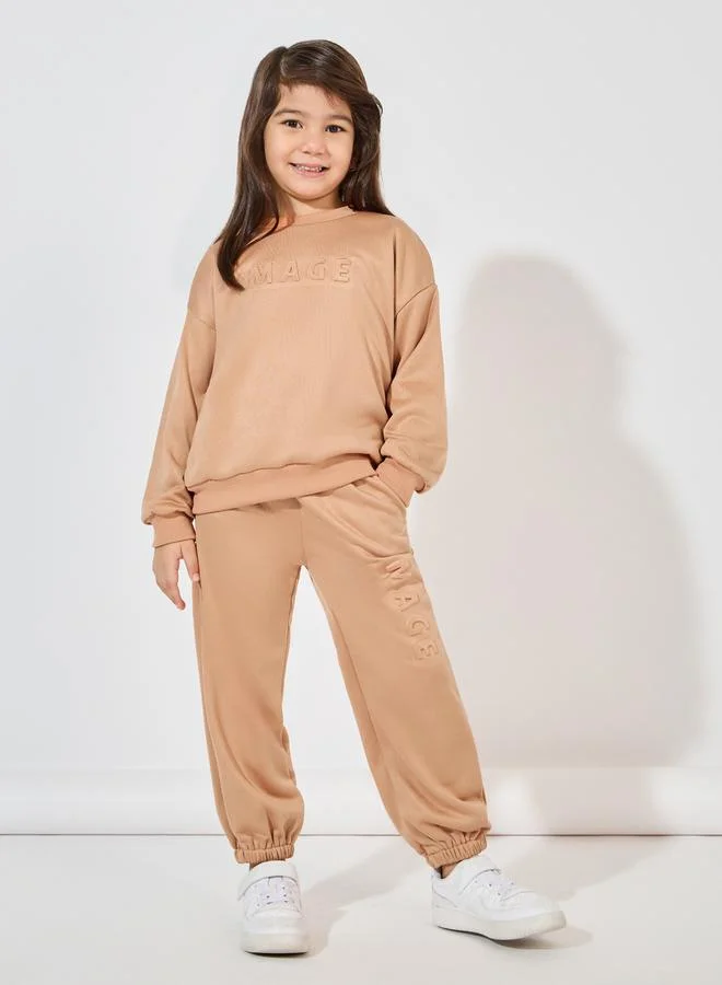 Styli Embossed Print Drop Shoulder Sweatshirt & Jogger Set