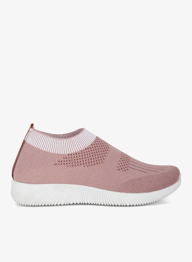 Flyknit Walking Sneakers in Pink