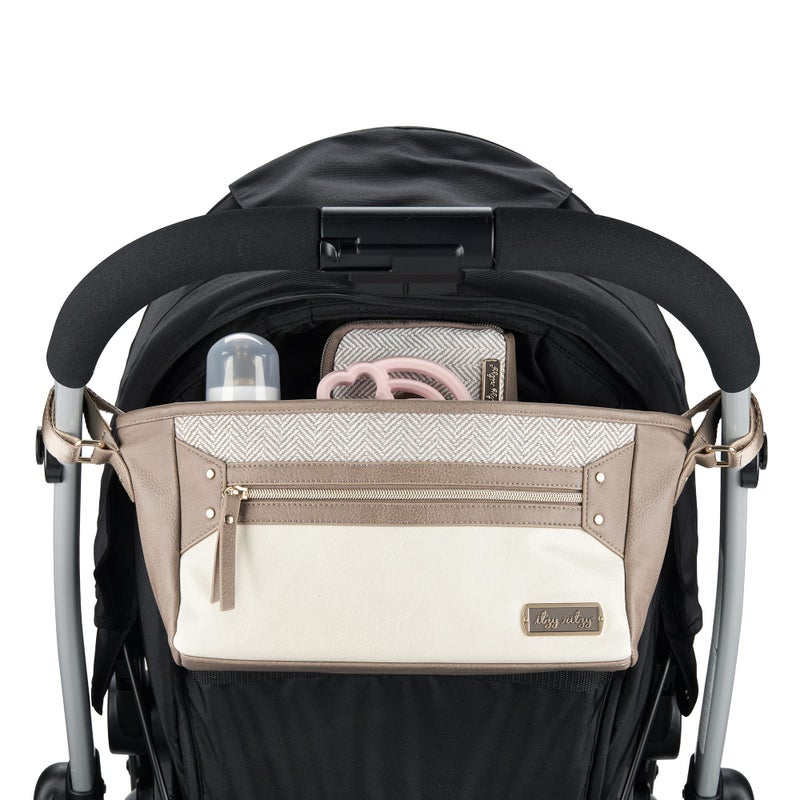 Itzy Ritzy Adjustable Stroller Caddy and Organizer Bag Featuring Front Zippered Pocket, 2 Built-In Interior Pockets & Adjustable Straps to Fit Nearly Any Stroller (Vanilla Latte) - Image 1