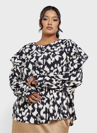 Ruffle Neck Detail Animal Print Blouse - pzsku/Z22B9339E2FAA501FECD2Z/45/_/1736707623/7dfbad21-aebc-4590-bb26-ffba26491f16