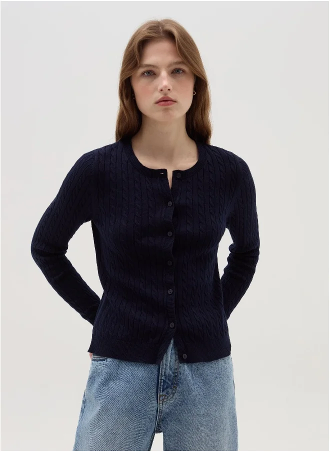 او في اس Cardigan with cable-knit design