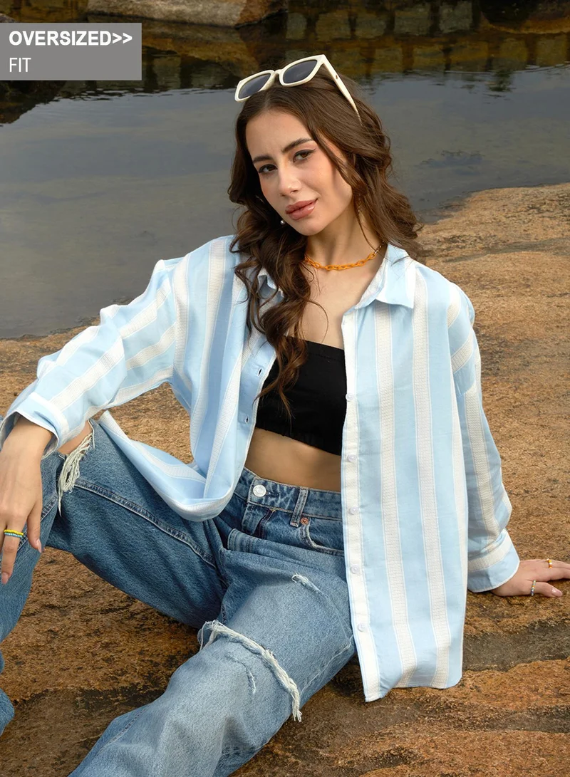 كامبوس سوترا قميص نسائي أزرق سماوي مخطط غير متماثل فضفاض من كامبس سوترا للملابس الكاجوال بياقة عريضة وأكمام طويلة وإغلاق بأزرار ومقاس فضفاض مريح للارتداء اليومي