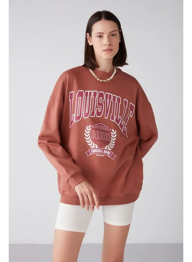 GRIMELANGE Ramona Women's Oversized Soft Fleece Lined Organic Cotton Printed Crew Neck Brick-Red Sweatshirt.