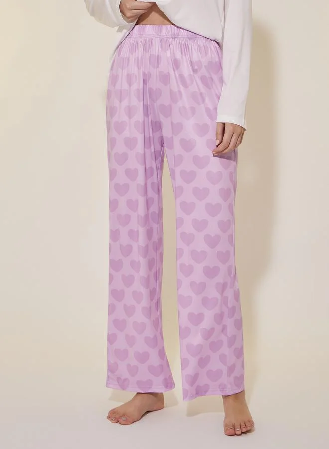 Take Two Asymmetric Hem Long Sleeve Tee and Hearted Printed Straight Leg Pants