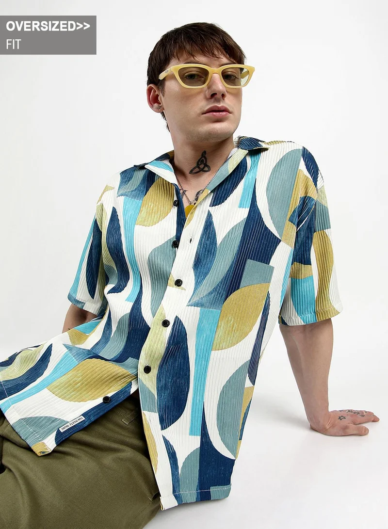 Campus Sutra Campus Sutra Men's Indigo Blue Oversized Abstract Curves Shirt For Casual Wear | Cuban Collar | Short Sleeve | Button Closure | Shirt Crafted With Comfort Fit For Everyday Wear