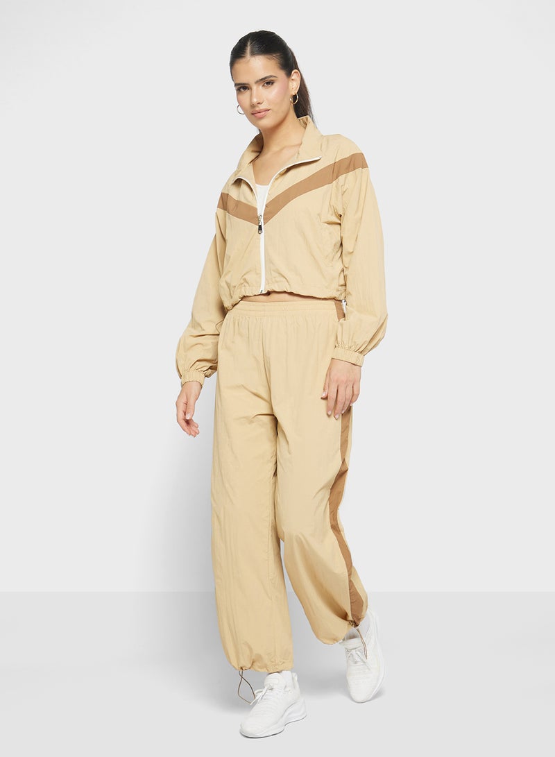 فورورد بدلة رياضية بسحاب وألوان متضاربة - Image 1