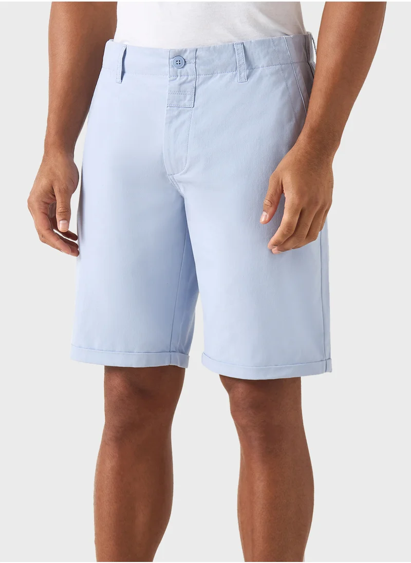 ايكونيك Iconic Solid Slim Fit Shorts with Button Closure