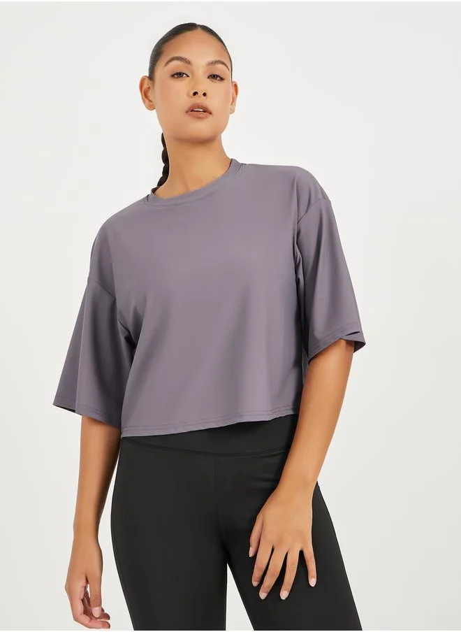 Styli Infinity Swirl Slogan Print Boxy Fit Top with Dropped Shoulder