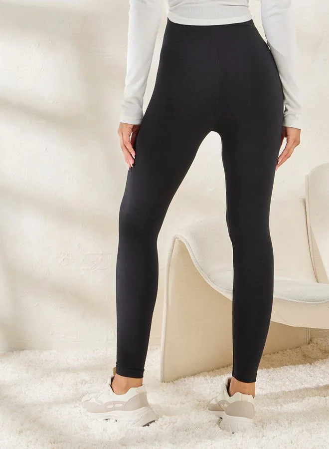 Styli Criss-Cross Waistband Ankle Length Leggings