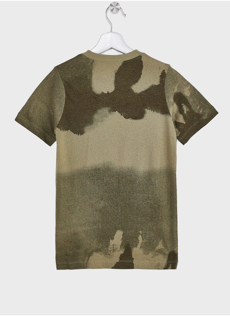 Nike - Club Seasonal All Over Printed T-Shirt - Image 1