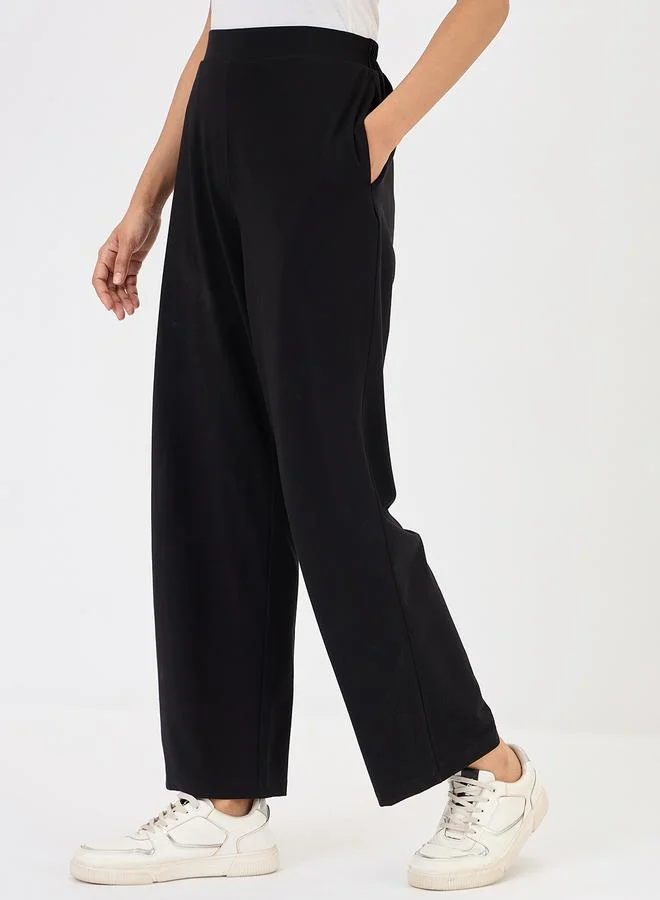 Femmella  Black Wide Leg Trousers for Women | Best Price UAE