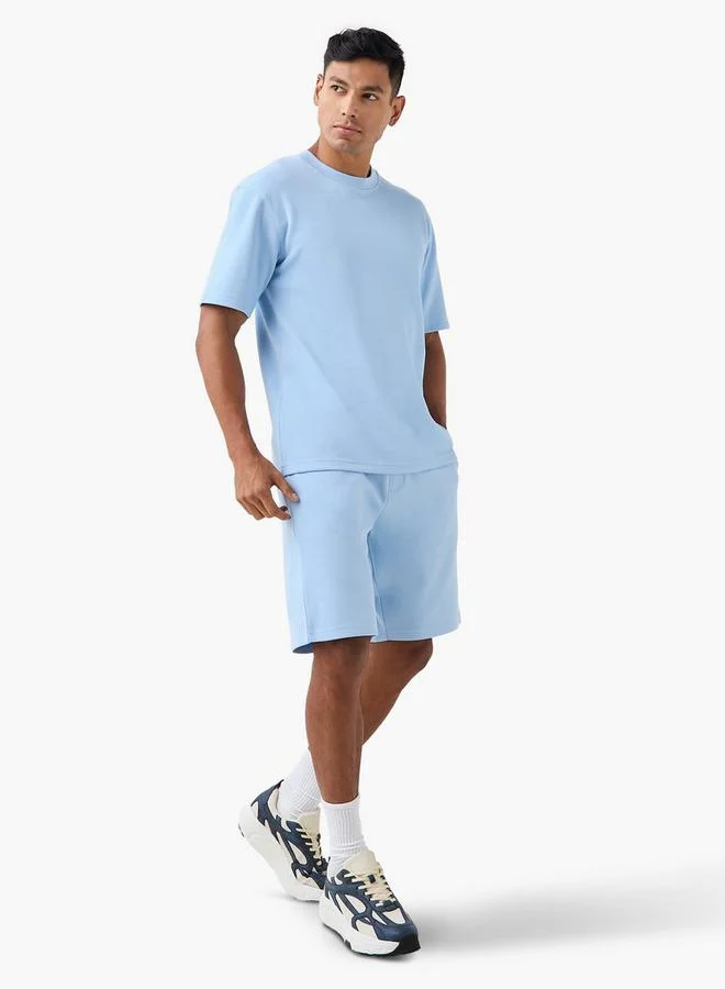 إمبيرور شورت إمبراطور بشعار وجيوب وإغلاق برباط