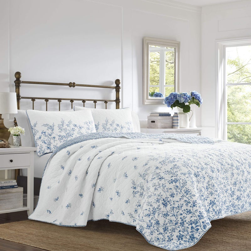 Laura Ashley Home - Twin Quilt Set, Reversible Cotton Bedding with Matching Sham, Pre-Washed Home Decor for Added Softness (Flora Blue, Twin) - Image 1