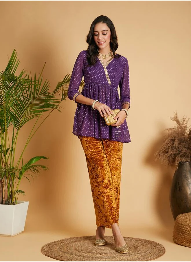 SASSAFRAS Spot Foil Print Lace Trim Wrap Peplum Top by Styli