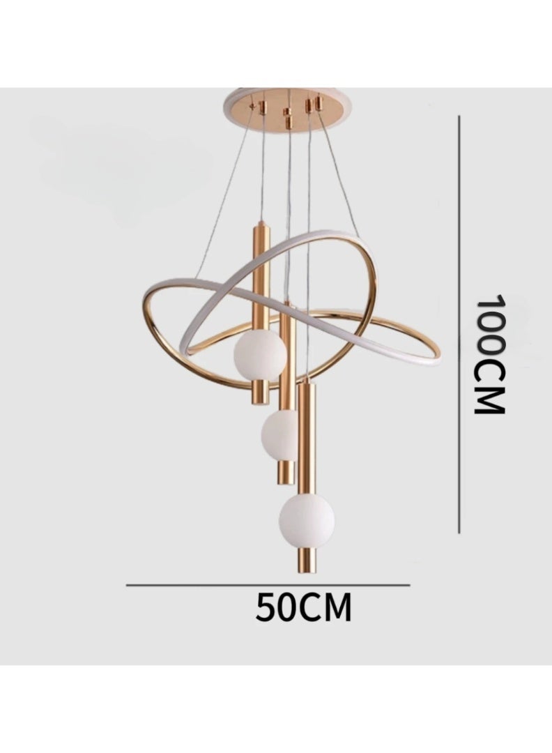 AL THURAYAT Luxurious and modern LED chandelier with design. The LED chandelier is made of high-quality materials and comes with three balls and crossed rings, 50 cm wide, with 3 lighting colors, and remote control. - Image 3