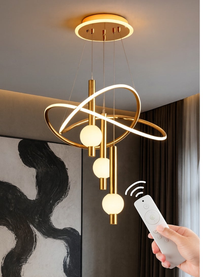AL THURAYAT Luxurious and modern LED chandelier with design. The LED chandelier is made of high-quality materials and comes with three balls and crossed rings, 50 cm wide, with 3 lighting colors, and remote control. - Image 4