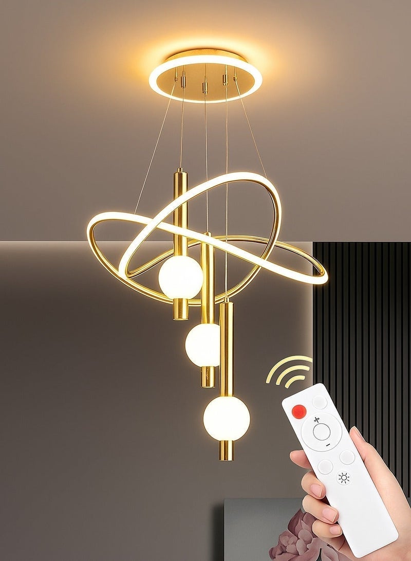 الثريات ثريا LED ذهبية فاخرة 60 سم – 3 كرات مضيئة بحلقات متقاطعة مع ريموت كنترول – تصميم عصري راقٍ لغرفة المعيشة والطعام - Image 1