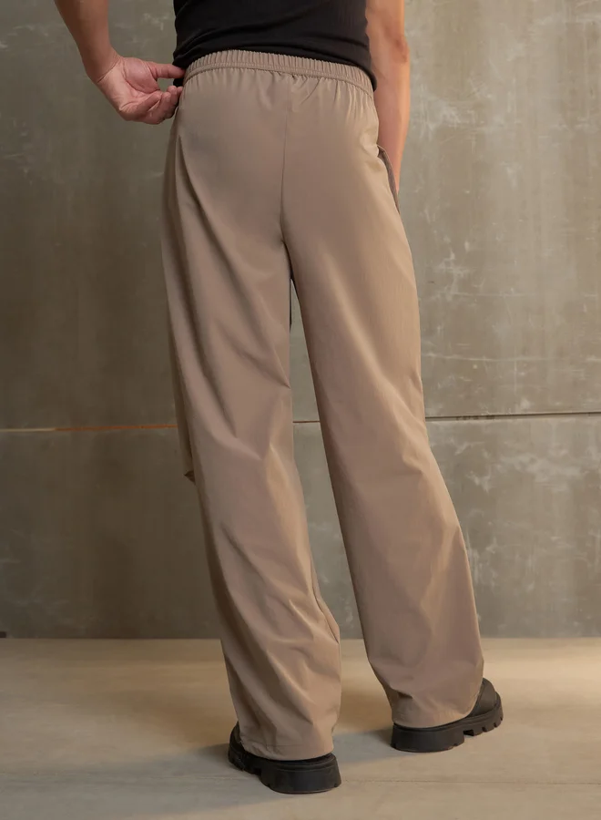 SASSAFRAS Solid Front Pleated Baggy Parachute Pants