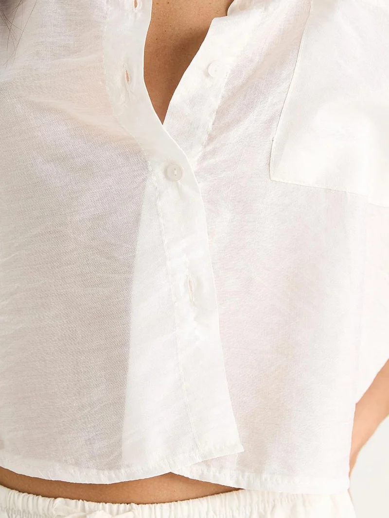 Bianco Lucci White LUCCI Textured Crop Shirt with Button Closure and Pocket for Women | Best Price UAE