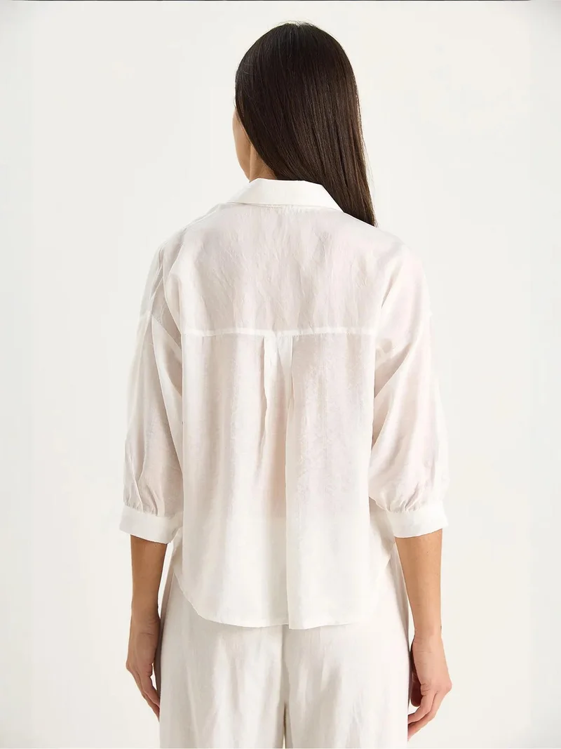 Bianco Lucci White LUCCI Textured Crop Shirt with Button Closure and Pocket for Women | Best Price UAE