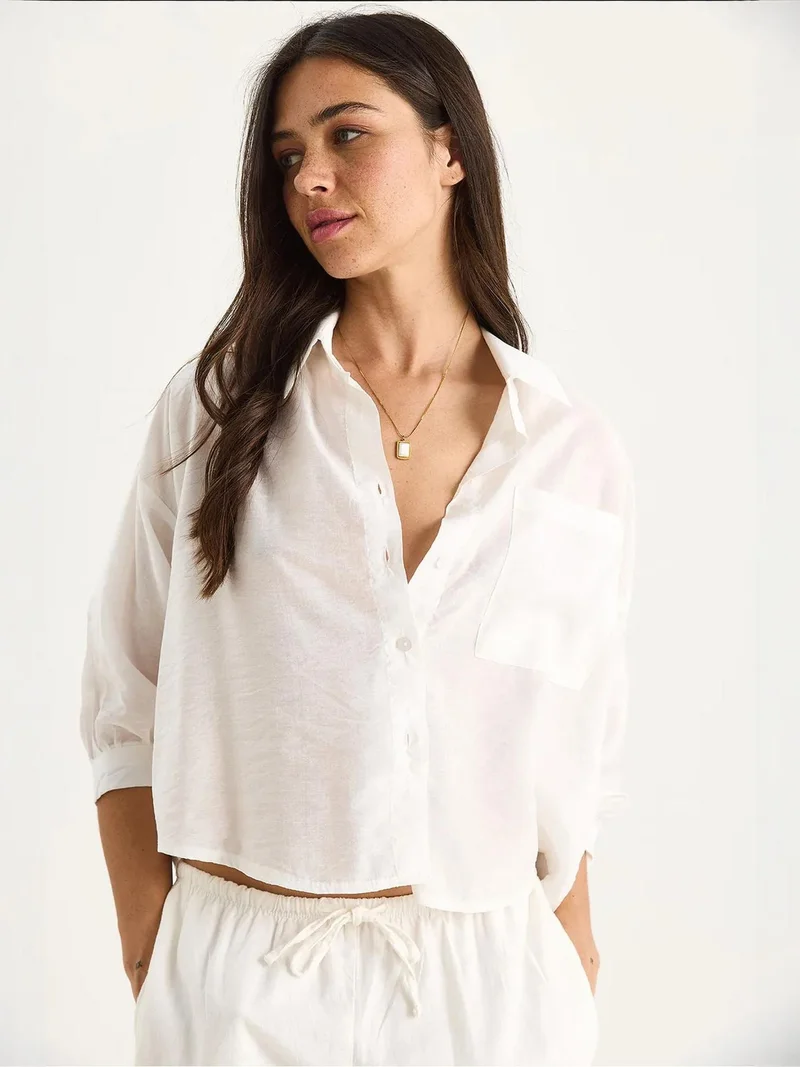Bianco Lucci White LUCCI Textured Crop Shirt with Button Closure and Pocket for Women | Best Price UAE