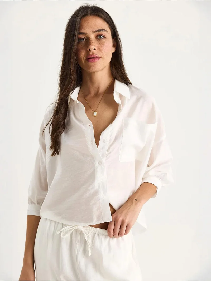 Bianco Lucci White LUCCI Textured Crop Shirt with Button Closure and Pocket for Women | Best Price UAE
