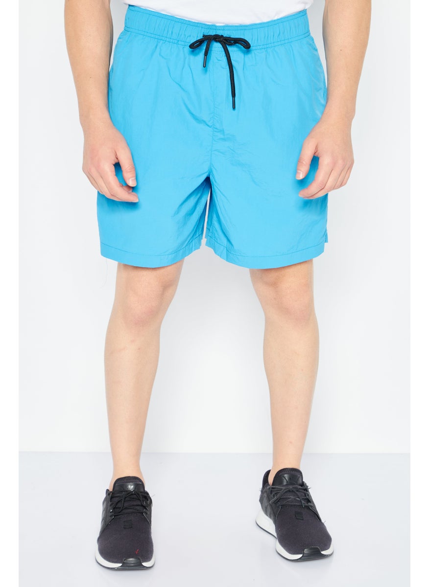 Men Plain Basic Shorts, Blue - pzsku/Z230EDEC2E07AFADF41CEZ/45/_/1724350995/8c4d2cb0-02f7-4d85-a3ba-0700421bfc9c