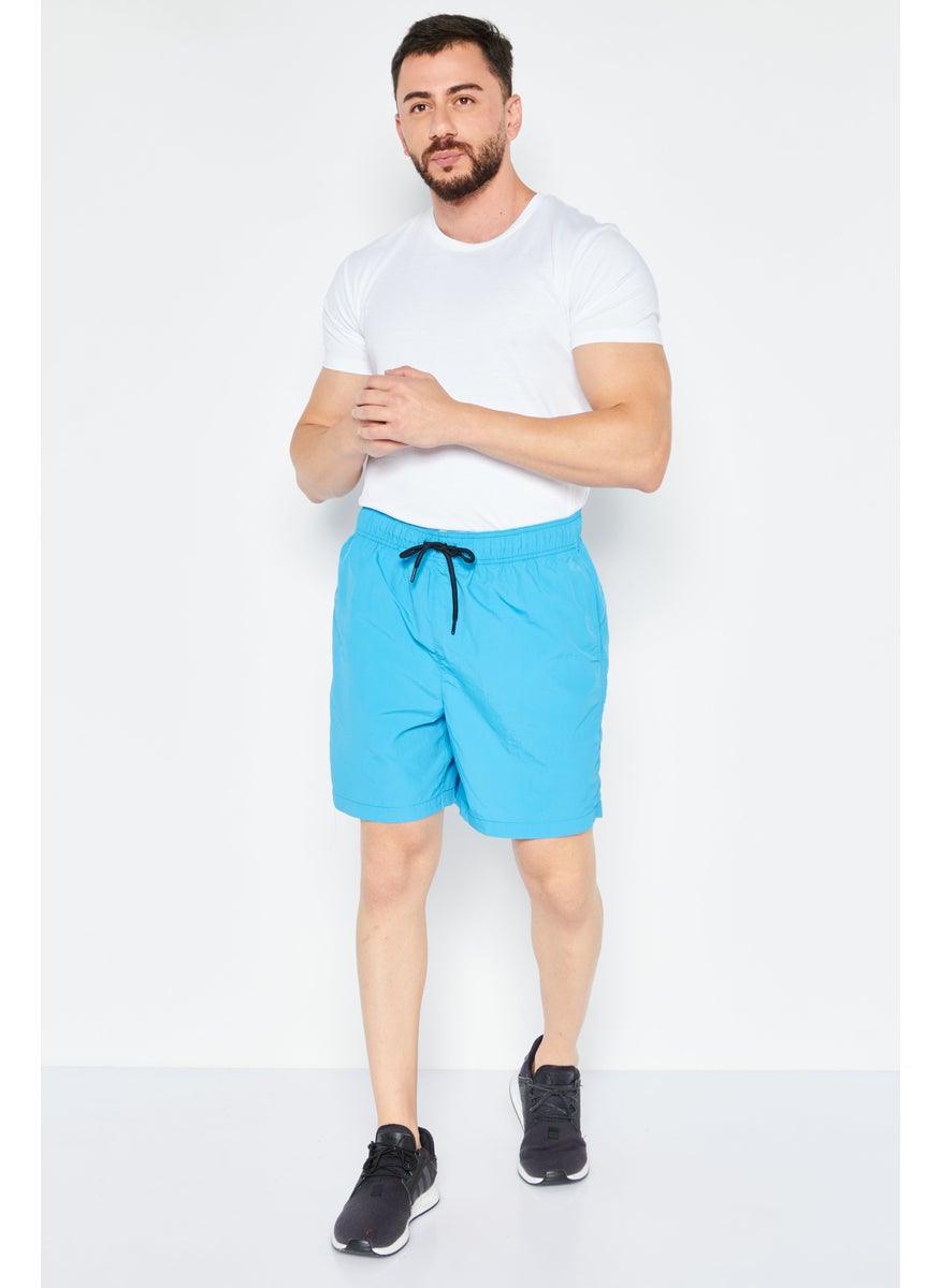 Men Plain Basic Shorts, Blue - pzsku/Z230EDEC2E07AFADF41CEZ/45/_/1726066886/6dd9abab-bed9-4e20-b876-faba007a59fb