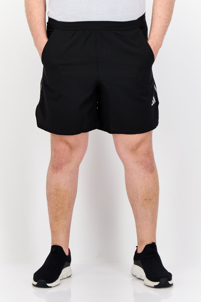 Adidas شورتات جري للرجال بقصة ضيقة بطول 7 إنش، أسود - Image 1