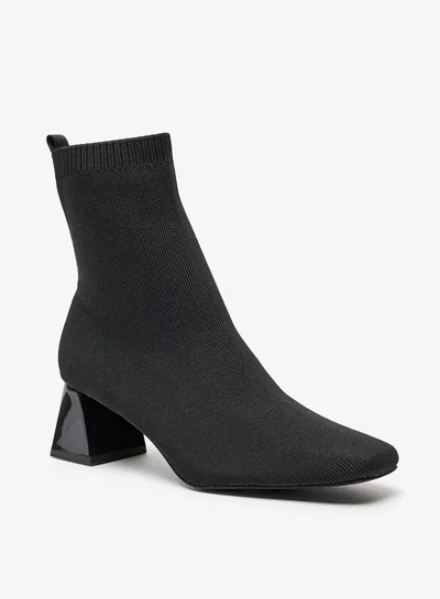 سيليست Women's Textured Slip-On Ankle Boots with Block Heels