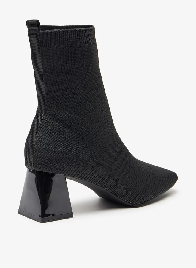 سيليست Women's Textured Slip-On Ankle Boots with Block Heels