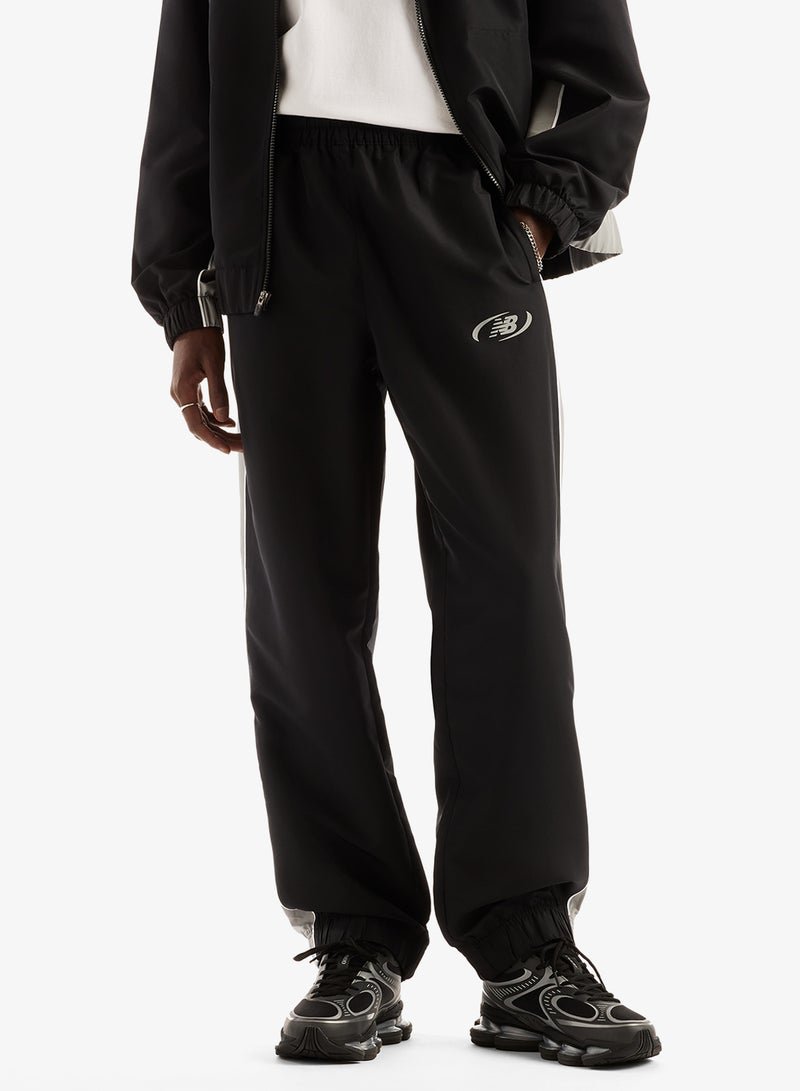 New Balance Trackside Woven Sweatpants - Image 1