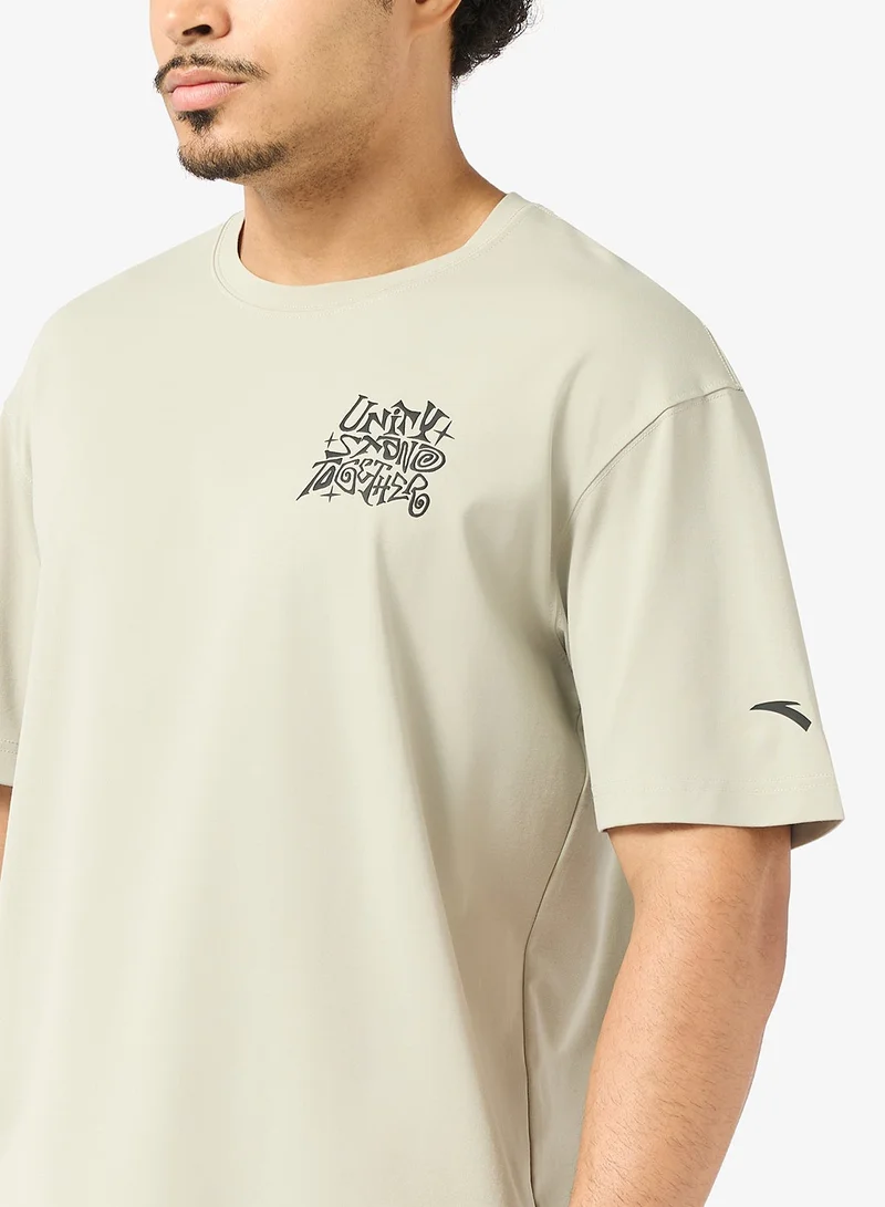 ANTA Mushroom Grey KAI Men’s Basketball T-Shirt/Breathable Performance · Lightweight Comfort · Signature Basketball Style for Men | Best Price UAE