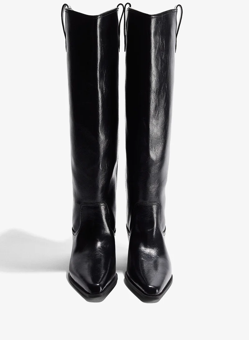 اتش اند ام بووت بطول يصل للركبة