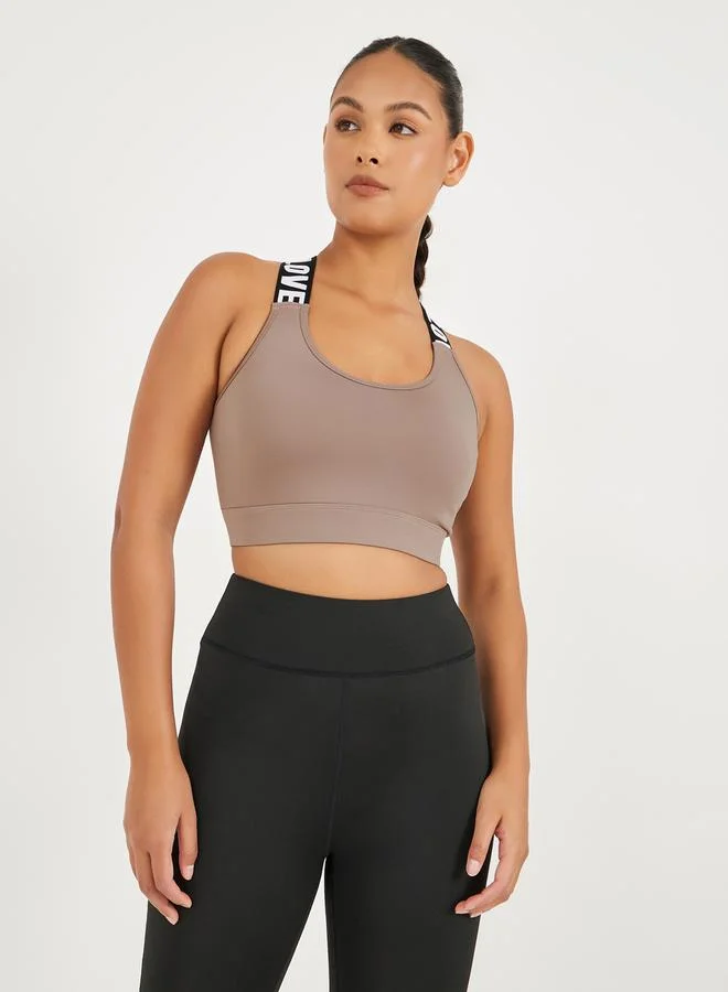 Styli Pack of 3 - Back Dual Mesh Panel Detail Split Hem Top, Taping Detail Sports Bra & Color Block Leggings Set