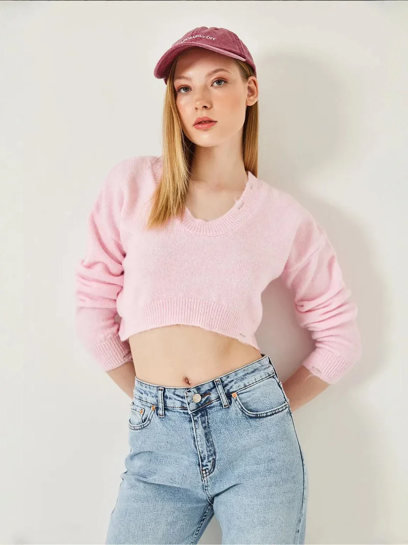 بيانكو لوتشي بلوزة قصيرة محبوكة بياقة على شكل حرف  من لوكسي