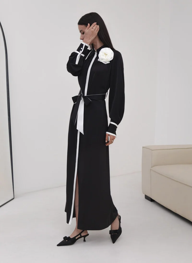 Lichi Maxi dress with contrasting inserts and flower brooch