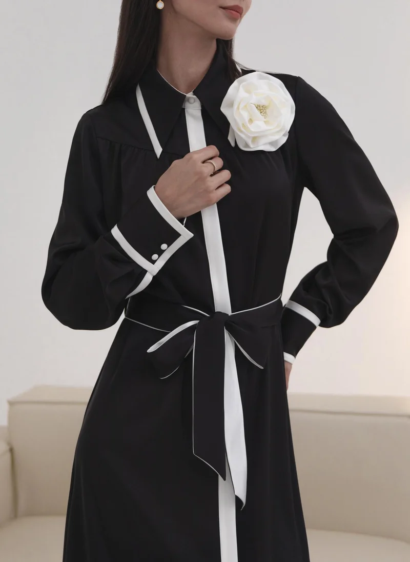 Lichi Maxi dress with contrasting inserts and flower brooch