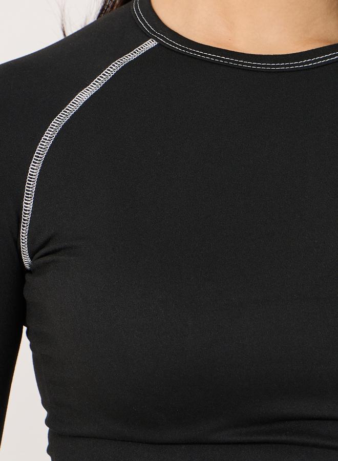 ستايلي تيشيرت مُجسم بتفاصيل مدروزة وأكمام ريجلان - Image 4