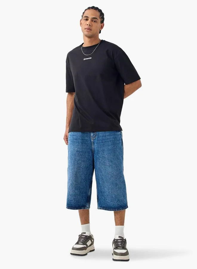 ستارتر تيشيرت ستارتير بطبعة شعار وأكمام قصيرة