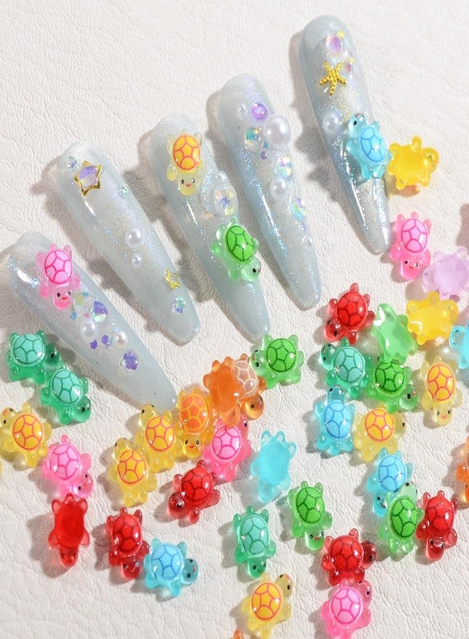 WEILUSI 100PCS Resin Sea Turtle Nail Charms - 7 Colors Mixed Cute Mini Tortoise 3D Animal Glow in The Dark Summer Ocean Charms - Rhinestones for Gift DIY Craft Nail Decoration - Image 1