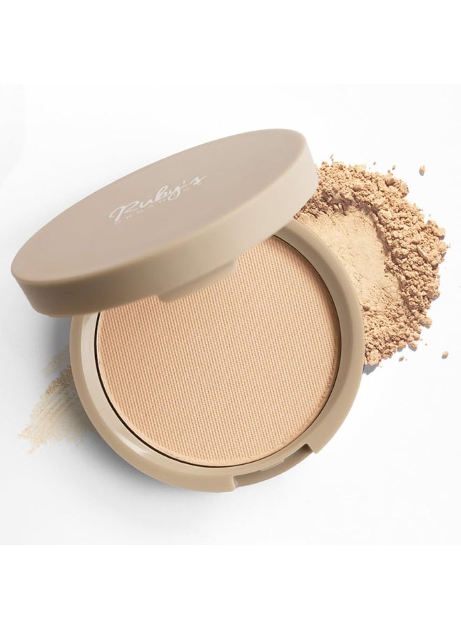 روبيز أورجانيك بودرة تثبيت مضغوطة من Ruby's Organics - لمسة نهائية مطفية (مات) تخفي المسام وتحتوي على عامل حماية من الشمس (SPF)؛ مناسبة لجميع أنواع البشرة، وتعمل على التحكم في الزيوت وإخفاء العيوب ومنح البشرة إشراقة طبيعية. منتج طبيعي، نباتي، خالٍ من البارابين، ولم يتم اختباره على الحيوانات - الدرجة SP2، وزن 9 جم. - Image 1